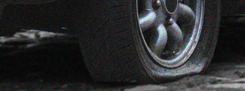 tire that is flat due to a puncture